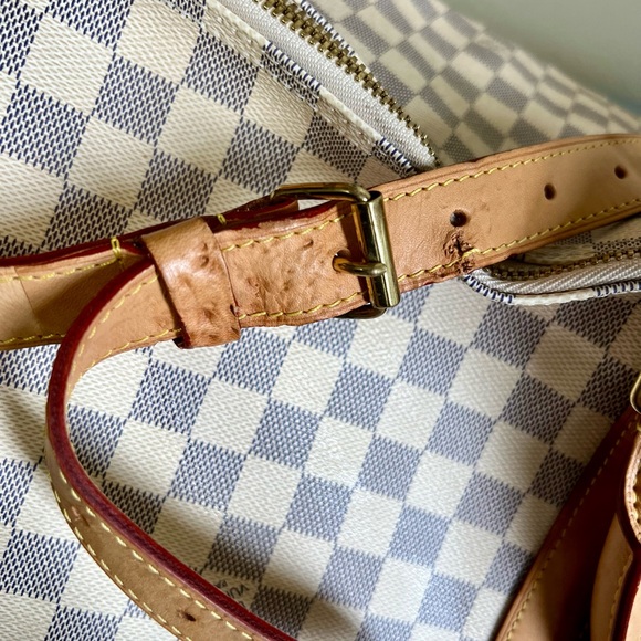 Louis Vuitton duffle bag, two of the straps are damaged as shown in pictures. - Picture 2 of 15